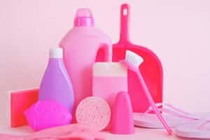 Bottle of hydrogen peroxide with cleaning supplies for household disinfecting